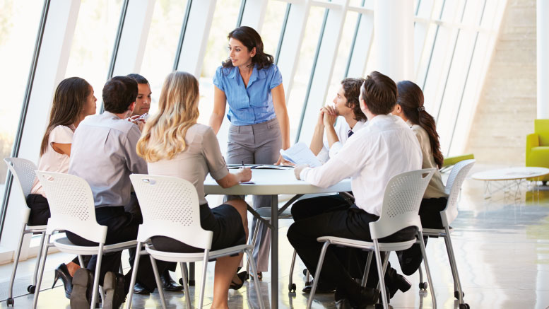 Team leader meeting with booth presenters